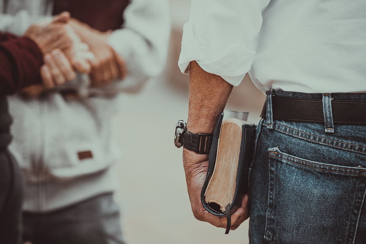 A person holding a bible