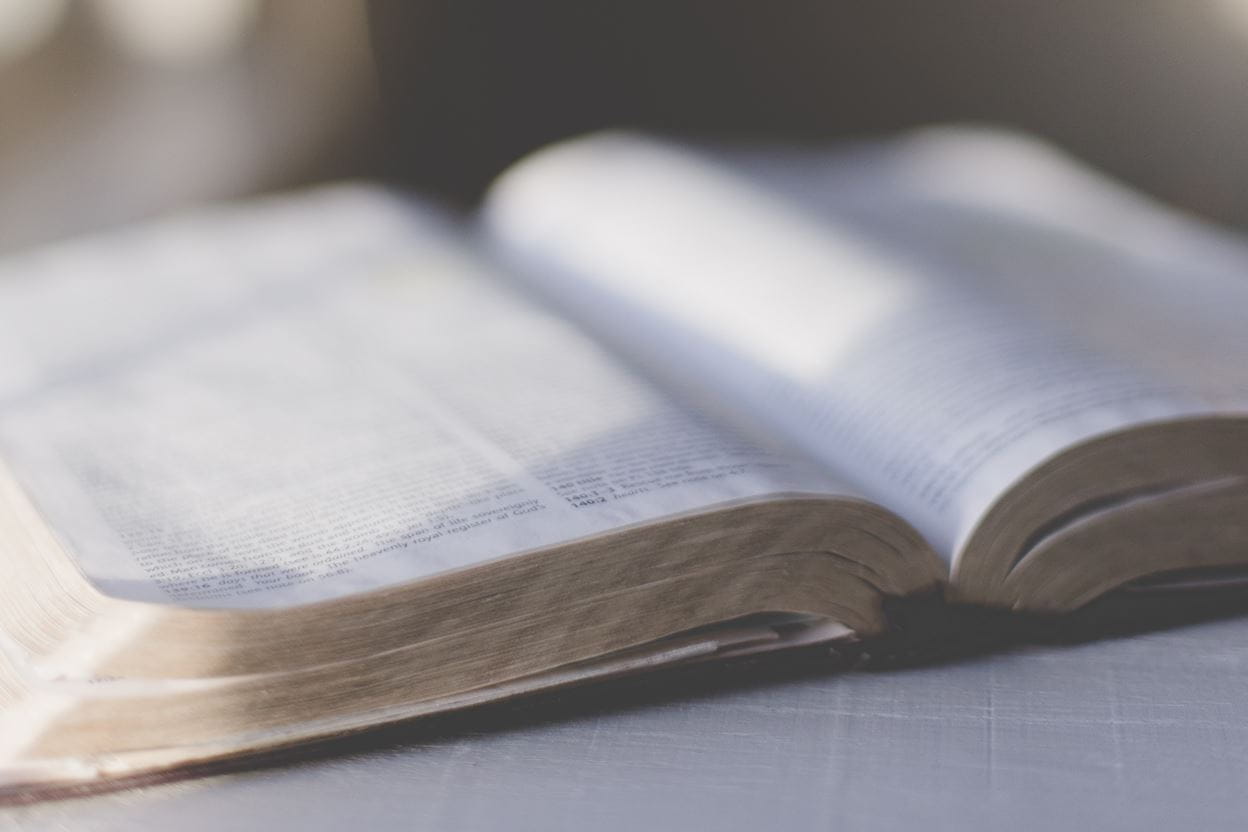 A close up of an open Bible ready for reading a daily devotional.