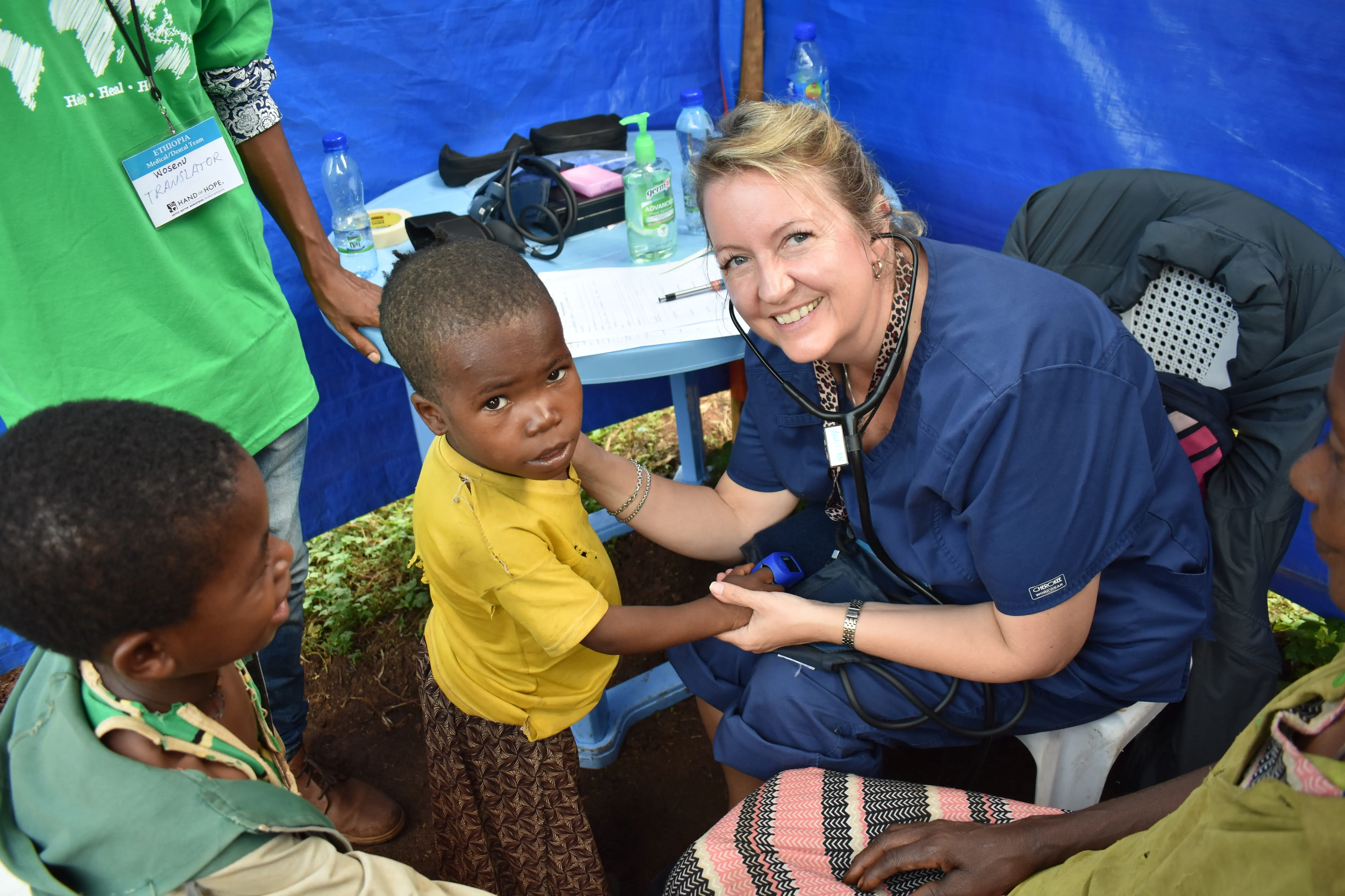 image of a nurse with a young patient